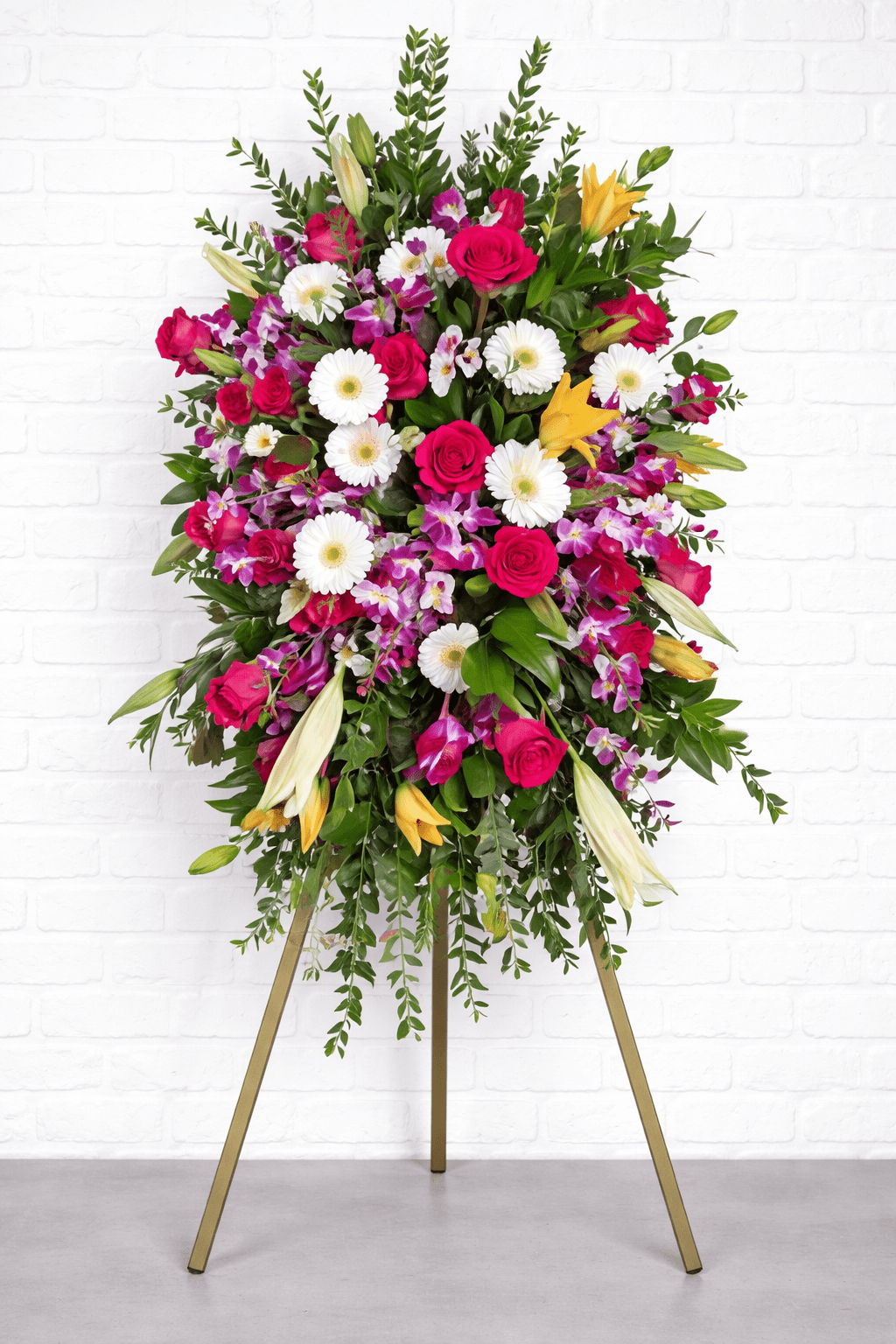 Vibrant Tribute Standing Spray - Garrett Florist